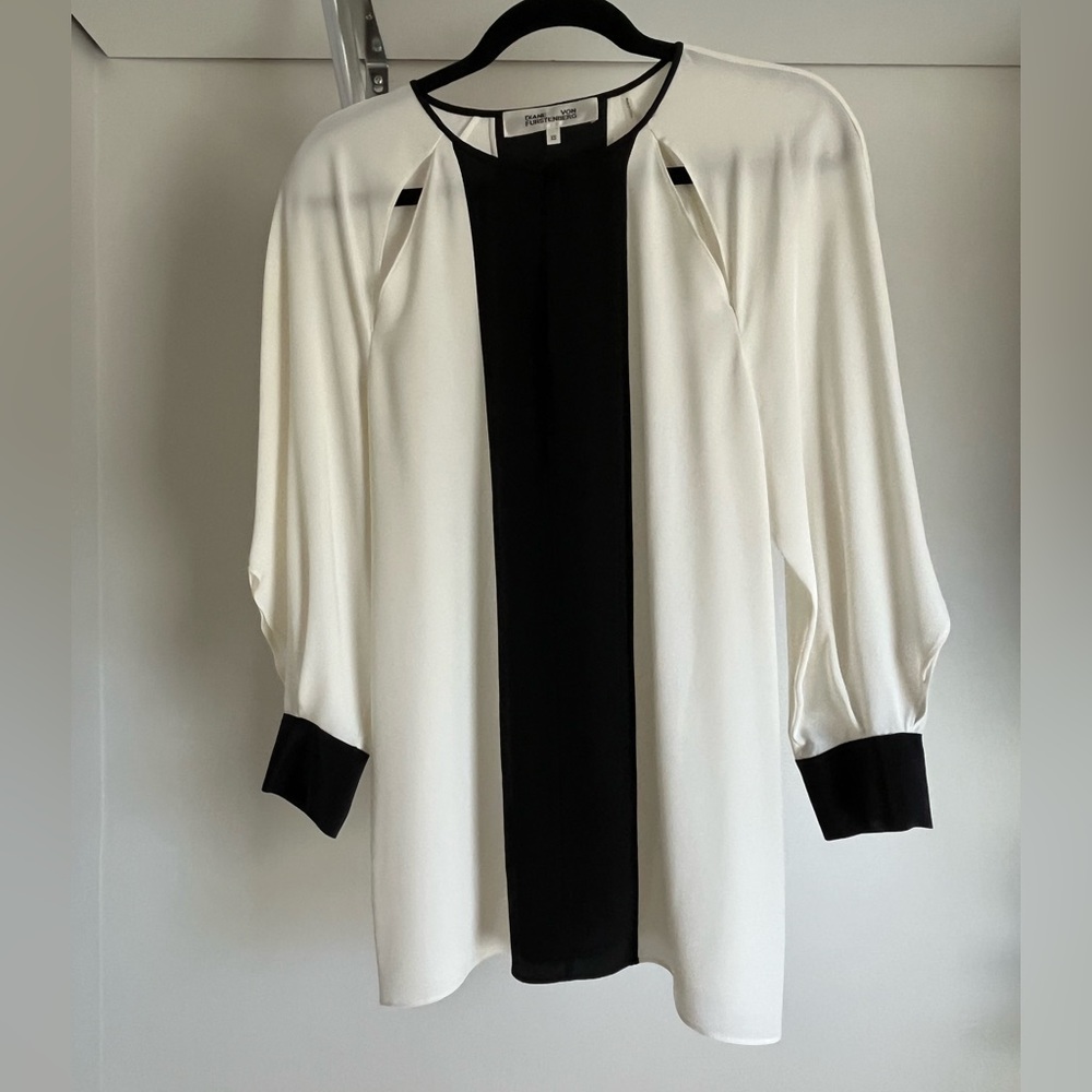 Structured designer silk blouse with front cut outs